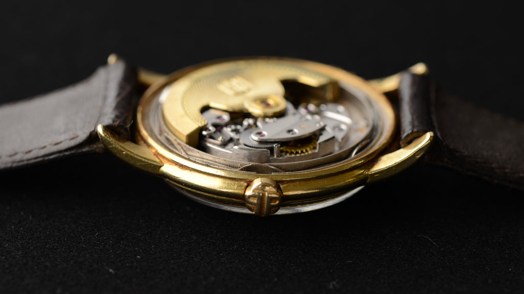1957 Patek Philippe Calatrava Ref. 2551J “Disco Volante” 18K, Gübelin Double-Signed, Cal. 12-600 AT